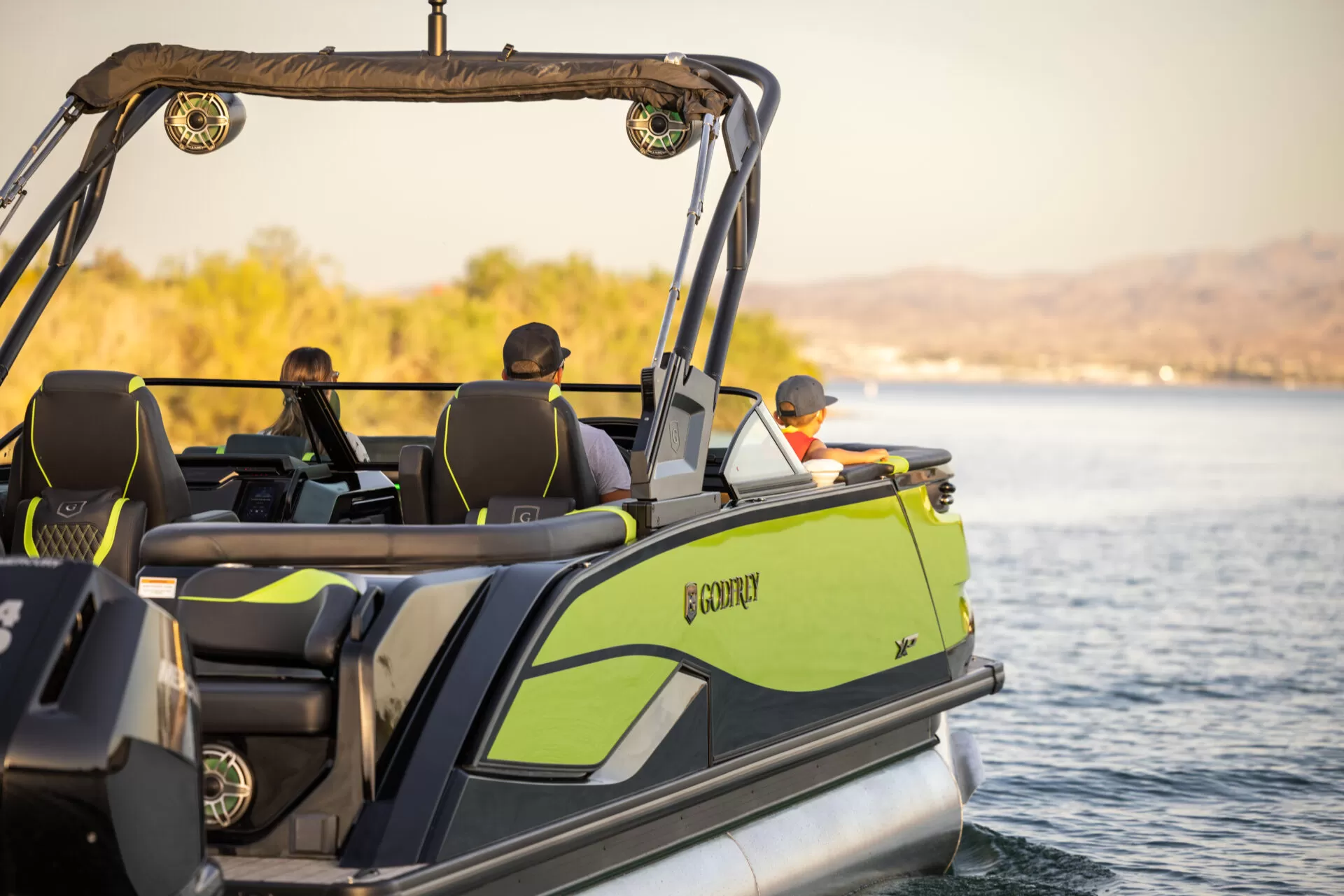 adventus club members on luxury green boat